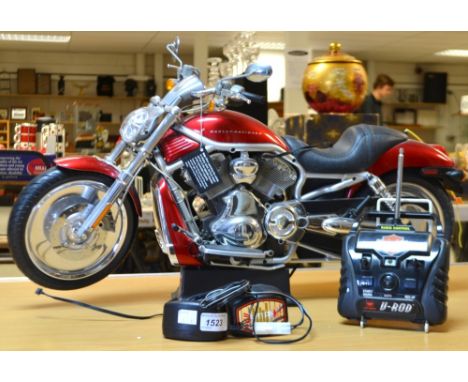 A scale model Harley Davidson remote control motor cycle, with charger, battery and remote (PAT Test £7)