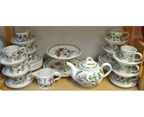 A Portmeirion Botanic Garden tea service comprising; teapot, twelve cups and saucers, twelve tea plates, cake stand, milk jug