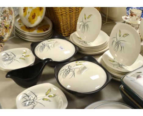 A Midwinter Bali-hai pattern dinner service comprising four dinner plates, side plates, side bowl, tureens, printed marks, et