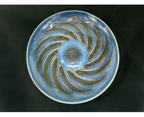 LALIQUE. A Lalique opalescent glass bowl in the Poissons pattern. At the centre, moulded naming & etched 'France'. Diameter 3