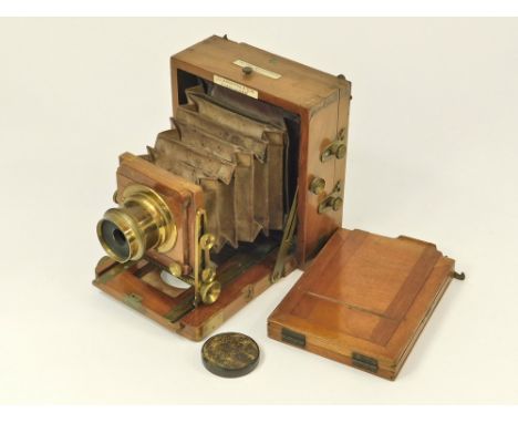 LANCASTER CAMERA. A Lancaster & Sons patent quarter plate, mahogany field camera, 'The 1897 Instantograph'. With J Lancaster 