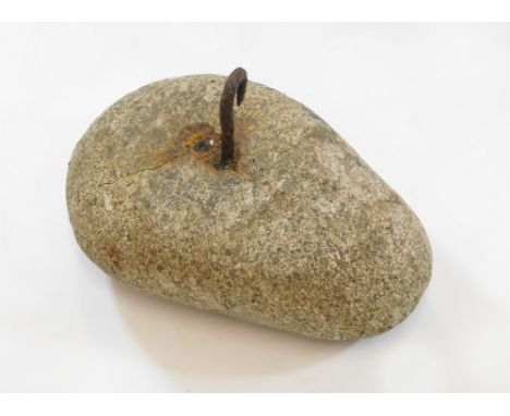 GRANITE WEIGHT. A granite beach boulder weight with large iron hook. Possibly from a 19th century beam & stone press used to 