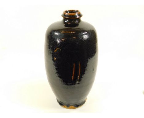 JIM MALONE. A Jim Malone, large tenmoku glazed bottle vase. Impressed personal & Llandegla marks Height 33cm.  Please note th