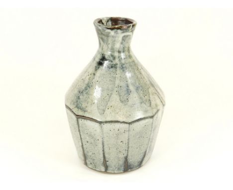TREVOR CORSER. A large, cut-sided bottle vase. Impressed personal & Leach Pottery marks Height 29cm.  Please note that all it
