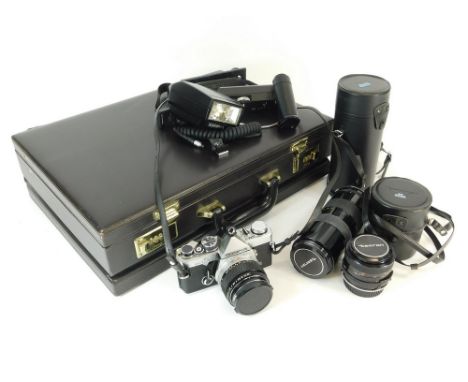 OLYMPUS CAMERA ETC. An Olympus OM2 Camera with various accessories, including an Olympus flash unit & Olympus Winder 2. Also,