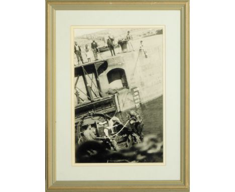 PENZANCE WET DOCK. A photographic print of a diver in standard dress diving off the dock gate sills in Penzance wet dock. NOT