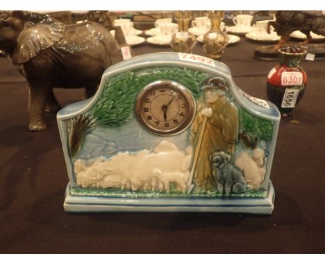 French clock in a Sarreguemines ceramic mount CONDITION REPORT: Clock is fully wound and not working, age related crazing how