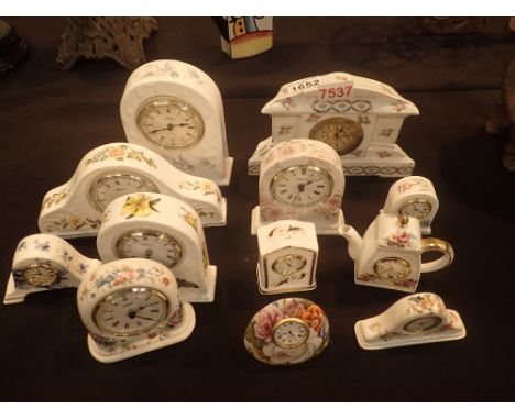 Collection of twelve ceramic clocks including Aynsley