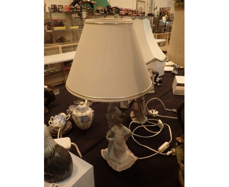 Two Nao lamps with young girls H: 30 cm CONDITION REPORT: The electrical items included in this lot have been PAT tested and 