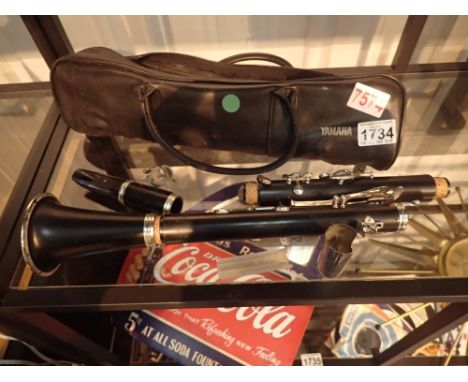 Cased Yamaha four piece clarinet 