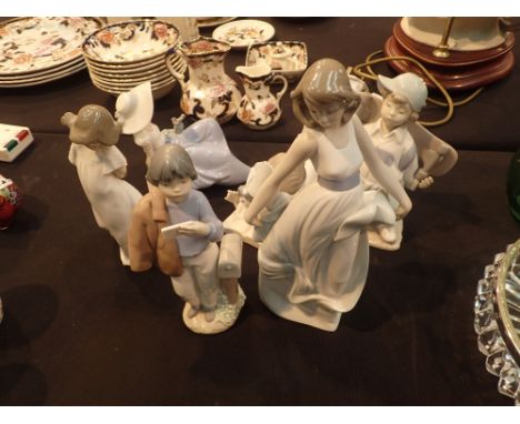 Collection of six Nao ceramic figurines