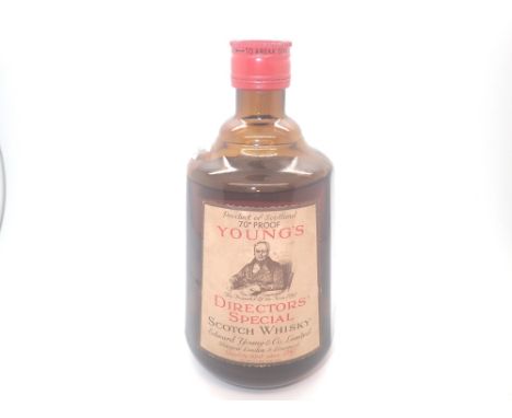 Bottle of vintage Youngs Directors Special scotch whisky 70% proof