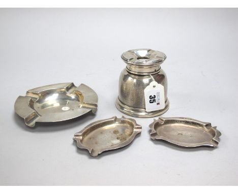 A Hallmarked Silver 'No Fume' Ashtray, SLd, Birmingham 1930, allover engine turned design (dents); A Hallmarked Silver Ashtra