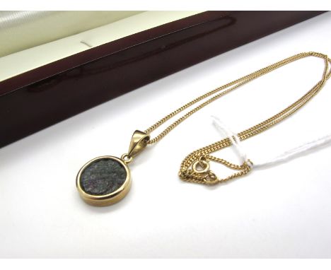 A Modern 9ct Gold Gems TV Widow's Mite Pendant, collet set, on a fine chain. 
