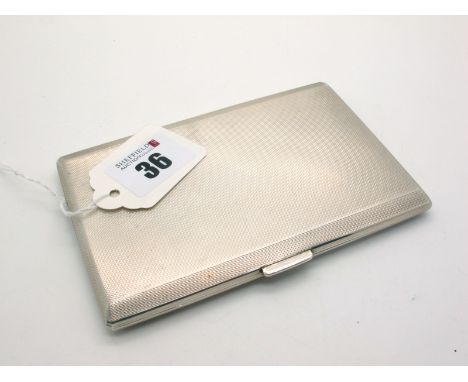 A Hallmarked Silver Cigarette Case, DBros, Birmingham 1966, of plain rectangular form, allover engine turned, gilt lined and 