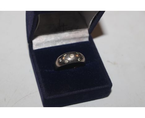 A 925 silver ring set with white stones, rings size L 