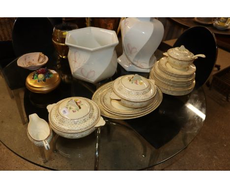 An Art Deco Royal Staffordshire pottery for Wilkinson Ltd. Clarice Cliff pattern part dinner service, comprising three tureen