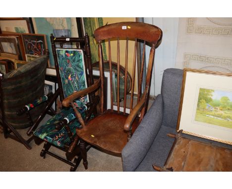 A 19th Century elm seated stick back chair 