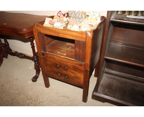 A Georgian mahogany tray top commode with tambour front 