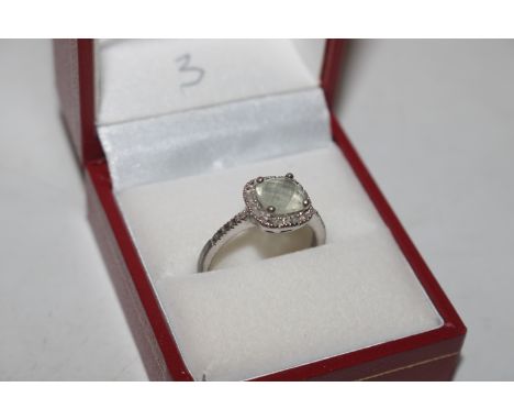 A 925 silver ring set with coloured and clear stones, ring size P/Q
