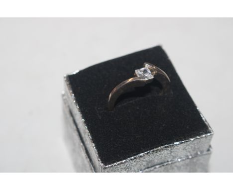 A 925 silver ring set with square white stone 