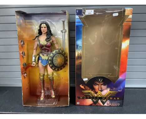 A Boxed Neca 1:4 Scale DC Wonder Woman Ultimate Collector's Action Figure, appears complete, opened packaging.