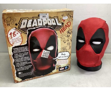 A Boxed Hasbro Marvel Legends Battery Operated 1:1 Scale Deadpool's Head, instruction leaflet present, tape to box noted.