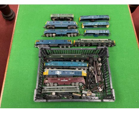 Ten OO gauge diesel locomotives by Lima, Hornby and others, together with bodies and other components, for spares or repair