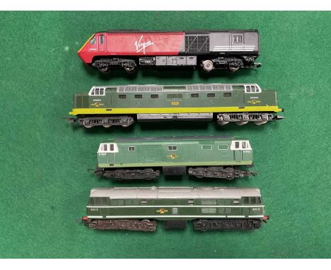 Four unboxed 00 gauge diesel locomotives including Lima Deltic and Triang Hornby Hymek, both in Green, all playworn and untes