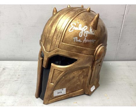 A 1/1 Scale Star Wars Mandalorian The Armorer Plastic Helmet. Signed Emily Swallow The Armorer - This is the way. (Unverified