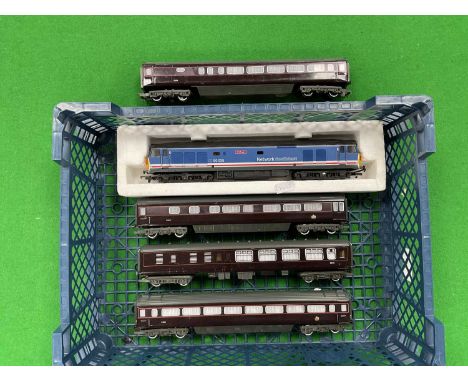 A Lima 00 gauge class 50 diesel locomotive "Ark Royal" in Network South East livery together with four Hornby Royal Train Coa