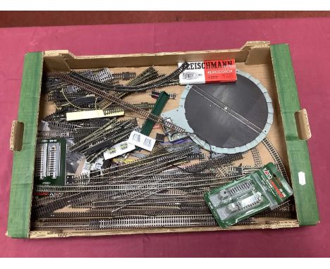 A quantity of N gauge track by Peco, Kato and Fleischmann including approximately thirty point#, a double slip and a three-wa