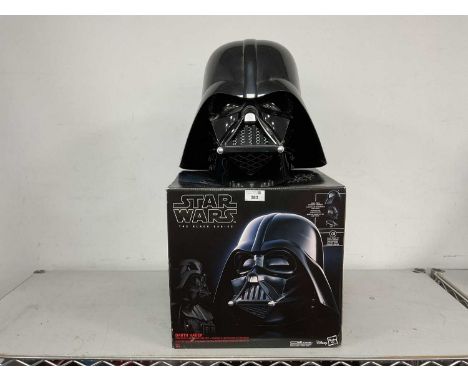 A Hasbro Star Wars 'The Black Series' Darth Vader 1:1 Scale Premium Electronic Helmet, packaging has been opened, instruction