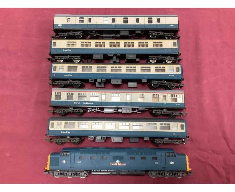 A Lima 00 gauge BR Blue Deltic diesel locomotive together with five BR Blue Grey coaches also by Lima, all unboxed, playworn 
