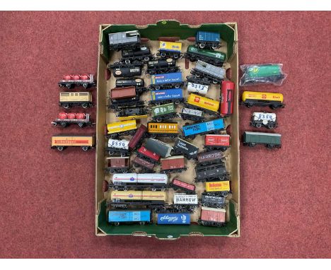 Approximately forty-five 00 gauge wagons by Hornby, Lima and others including some kit-built, all playworn.