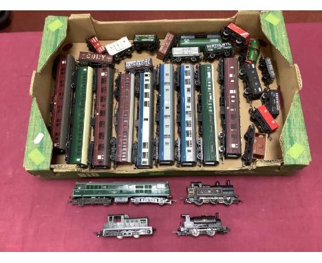 Four 00 gauge locomotives by Triang, Lima and Hornby together with Nine coaches and sixteen wagons, playworn untested.