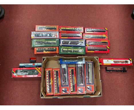 Approximately twenty boxed 00 gauge coaches by Hornby, Bachmann, Dapol and others.