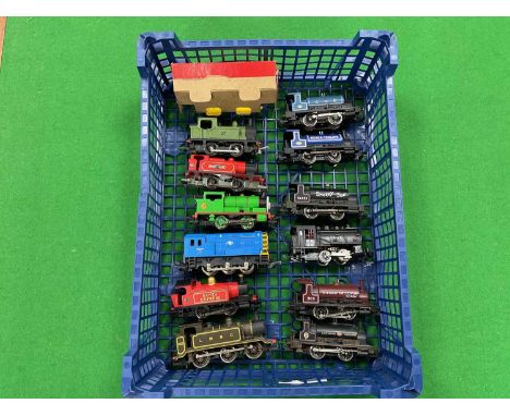 Twelve unboxed 00 gauge small locomotives by Hornby and Lima, including two 0-6-0s and ten 0-4-0s, all playworn and untested.