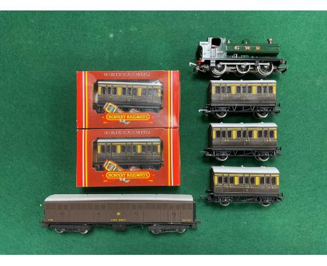 An OO gauge GWR branch train consisting of a Triang-Hornby 0-6-0 pannier tank locomotive (untested), five four-wheel coaches 