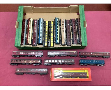 Nineteen OO gauge coaches by Lima, Hornby and others including a Mainline 50ft Parcels Van in BR Blue, playworn.