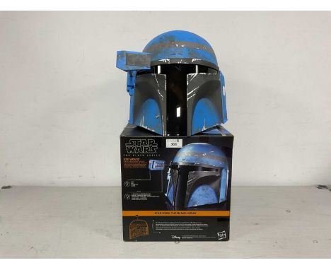 A Hasbro Star Wars 'The Black Series' Axe Wolves 1:1 Scale Electronic Helmet, packaging has been opened, instruction leaflet 