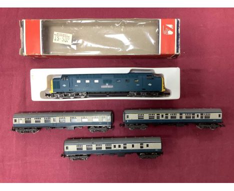 A boxed Lima N gauge Deltic locomotive in BR Blue, together with three coaches in Blue Grey, untested.
