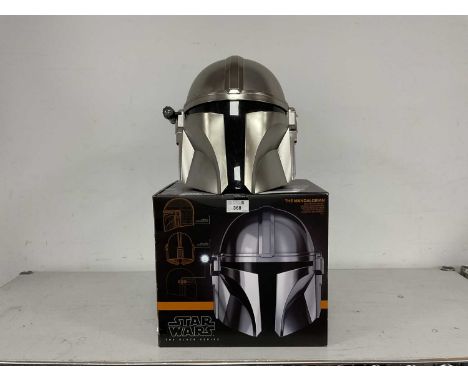 A Hasbro The Black Series Star Wars 1:1 Scale The Mandalorian Electronic Helmet, instruction leaflet missing, some scuffs/mar