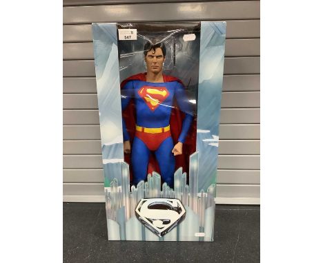 A Neca 1/4 Scale Superman The Movie - Clark Kent as Superman Plastic Action Figure, blemish to chin noted, packaging has been