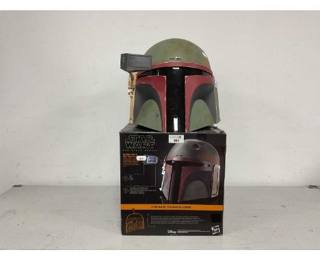A Hasbro Star Wars 'The Black Series' Boba Fett (Re-Armored) 1:1 Scale Electronic Helmet, packaging has been opened, instruct