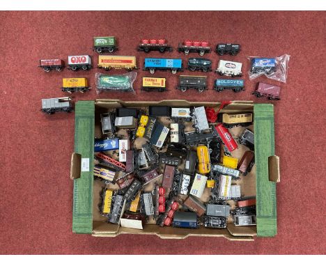 Approximately fifty 00 gauge wagons by Hornby, Mainline, Dapol and others, playworn.