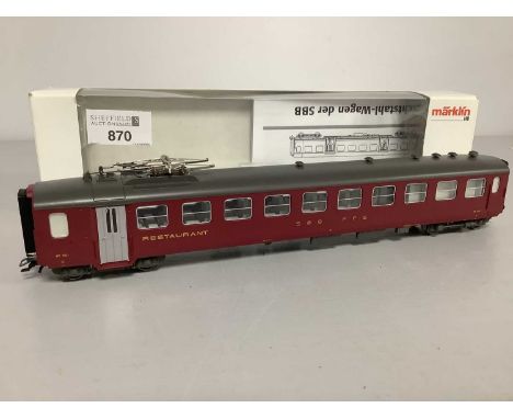 A boxed Marklin HO scale Swiss Restaurant Car.