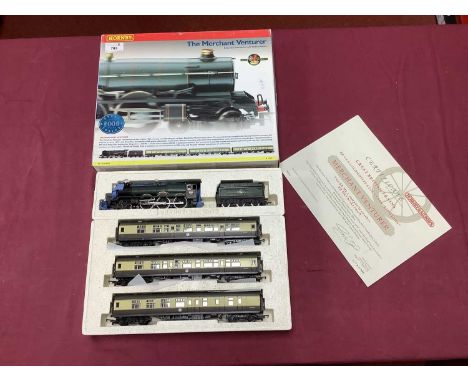 A boxed Hornby 00 Gauge "Merchant Venturer" train pack comprising King Class locomotive, and three coaches. (Noted loco handr