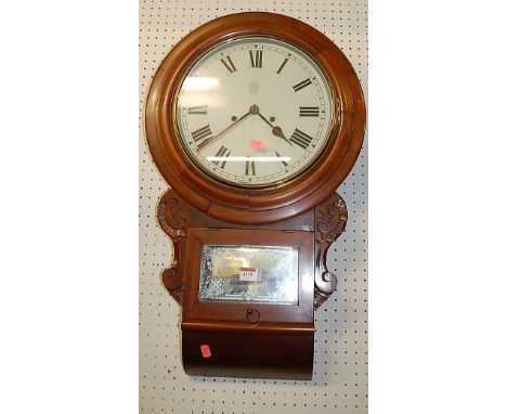 A Victorian mahogany circular drop trunk wall clock, the white enamel dial with lozenge shape trade mark