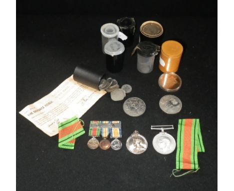 A SET OF THREE FIRST WORLD WAR MINIATURE WAR MEDALS, a 1939 defence medal, a George V Faithful Service Medal awarded to Georg